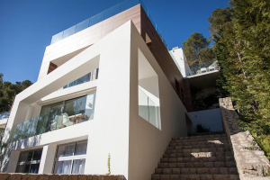 Villa Cube - A 5 bedroom all suite villa for sale in Cala Longa, Ibiza. 4 stories with lift, swimming poo